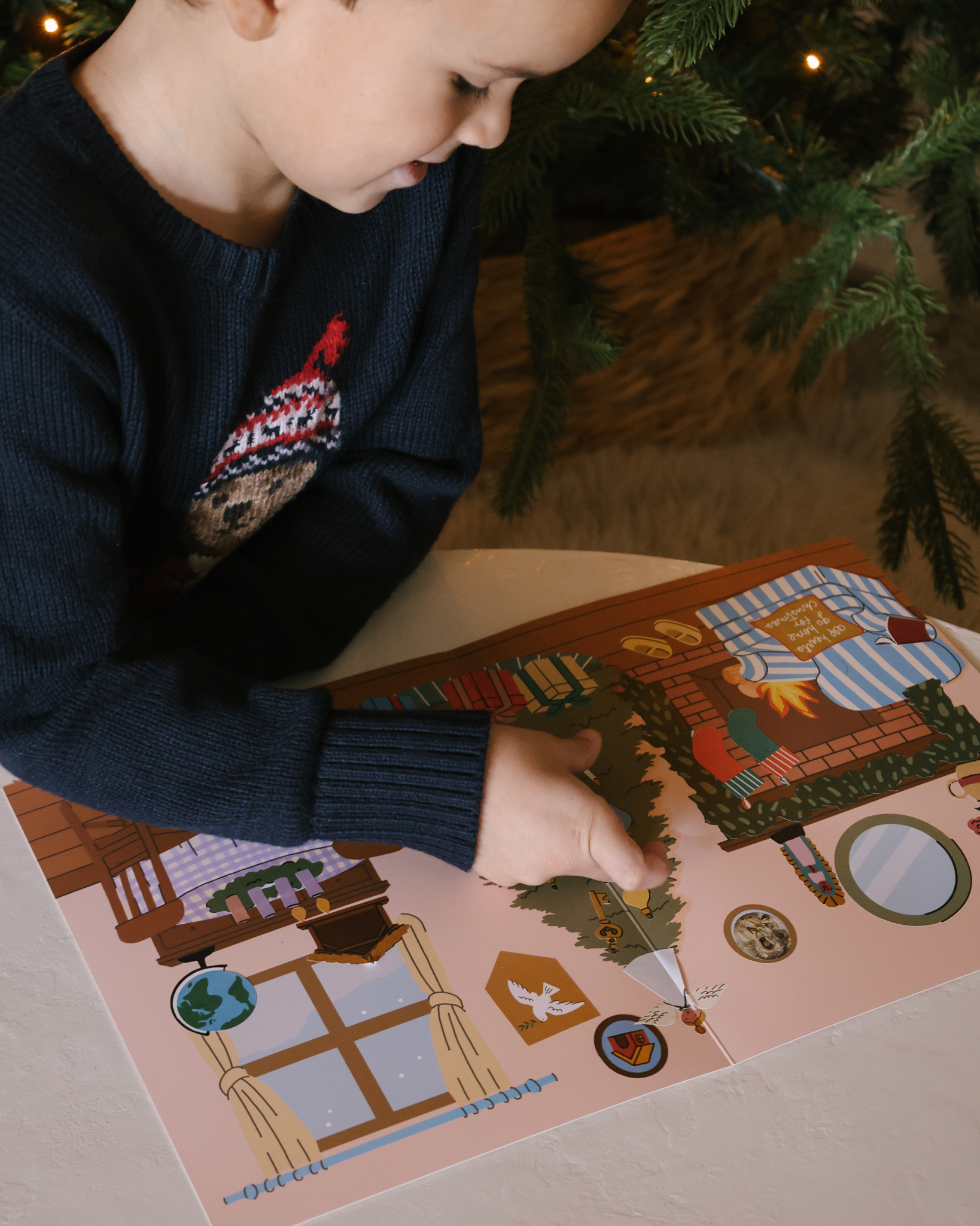 Liturgical Advent Calendar with illustrated scene and 26 sticker sheets, teaching children about Advent, feast days, and Christmas traditions. Suitable for ages 4+.