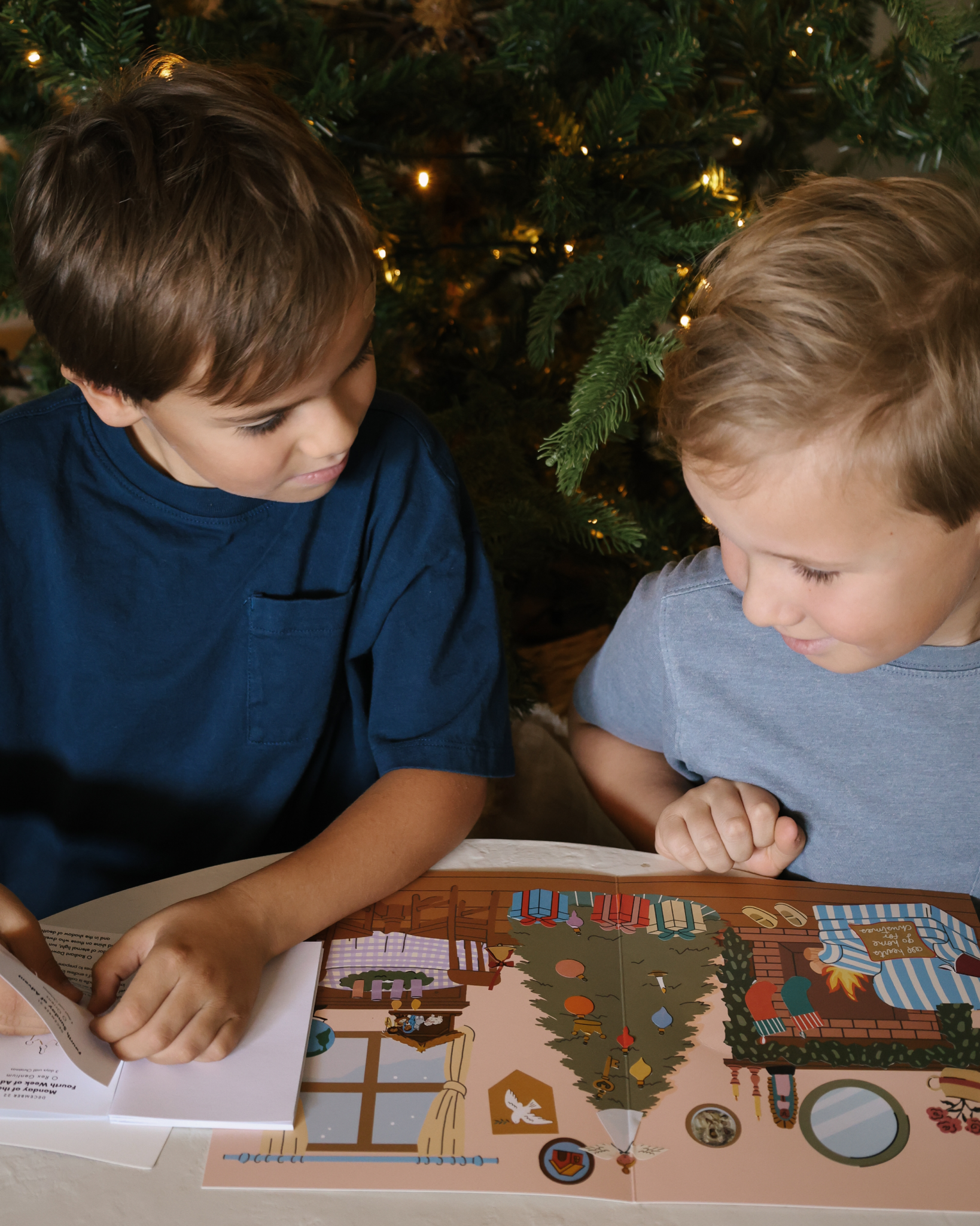 Liturgical Advent Calendar with illustrated scene and 26 sticker sheets, teaching children about Advent, feast days, and Christmas traditions. Suitable for ages 4+.