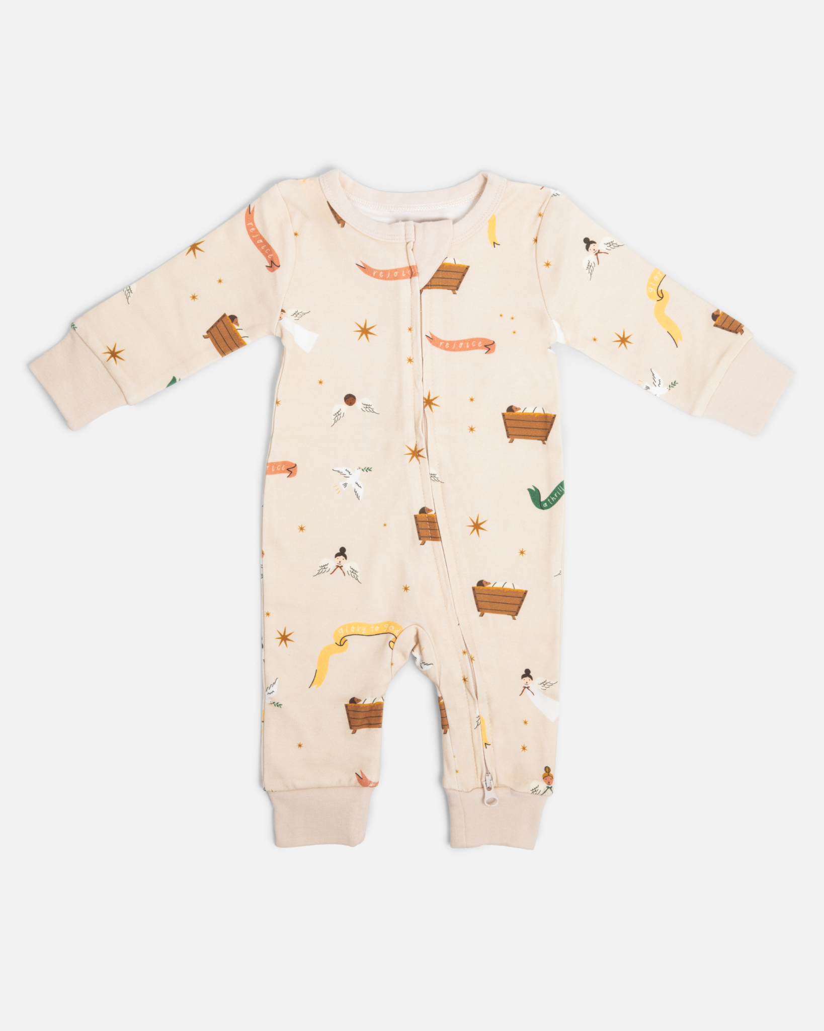 Children’s Christmas pajamas—sleeper and long john styles—with illustrations of angels, baby Jesus in the manger, and doves.