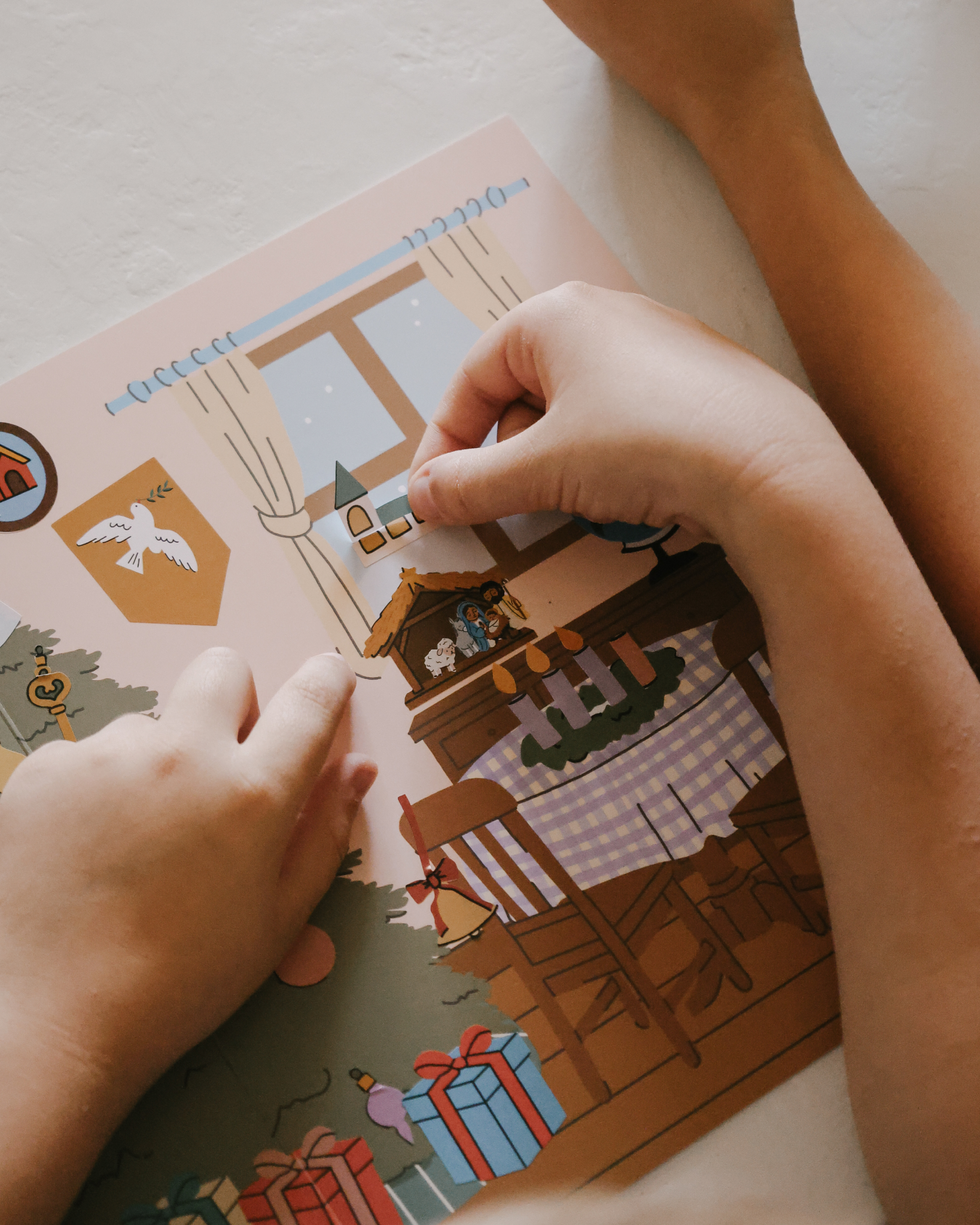 Liturgical Advent Calendar with illustrated scene and 26 sticker sheets, teaching children about Advent, feast days, and Christmas traditions. Suitable for ages 4+.