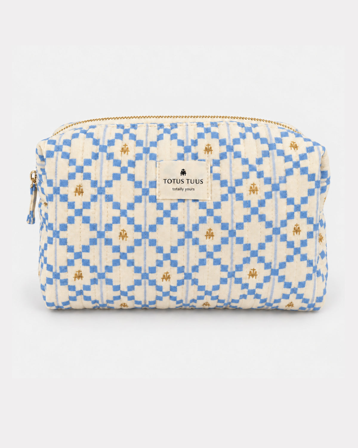 Marian Quilted Toiletry Bag in blue and cream check with gold Marian monograms and a woven Totus Tuus label
