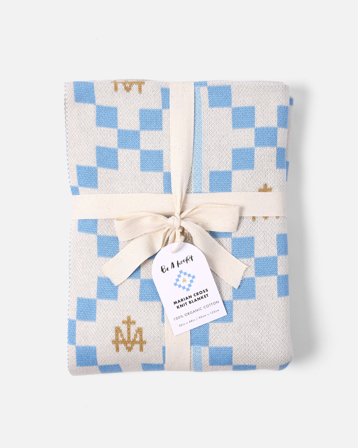 Marian Cross Organic Cotton Knit Blanket tied with ribbon and gift tag