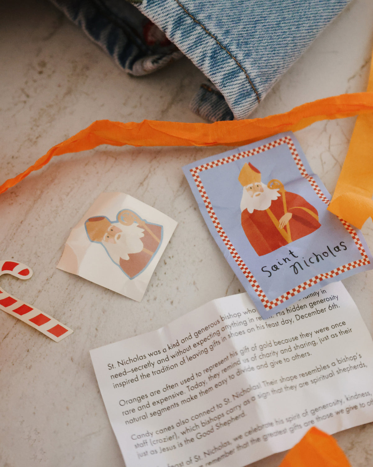 St. Nicholas prayer card, stickers and candy cane sticker from the St. Nicholas Orange Surprise Ball